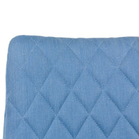 Blue quilted fabric with a diamond pattern, perfect for adding comfort and style to any space.