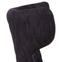 Dark quilted fabric with a textured pattern, featuring deep navy tones and a soft, modern design.