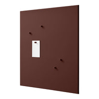 Brown wall panel with a smooth matte finish, featuring four small protrusions and a contrasting white tag.