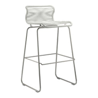 White bar stool with textured, wavy pattern and sleek metal frame, perfect for modern decor.
