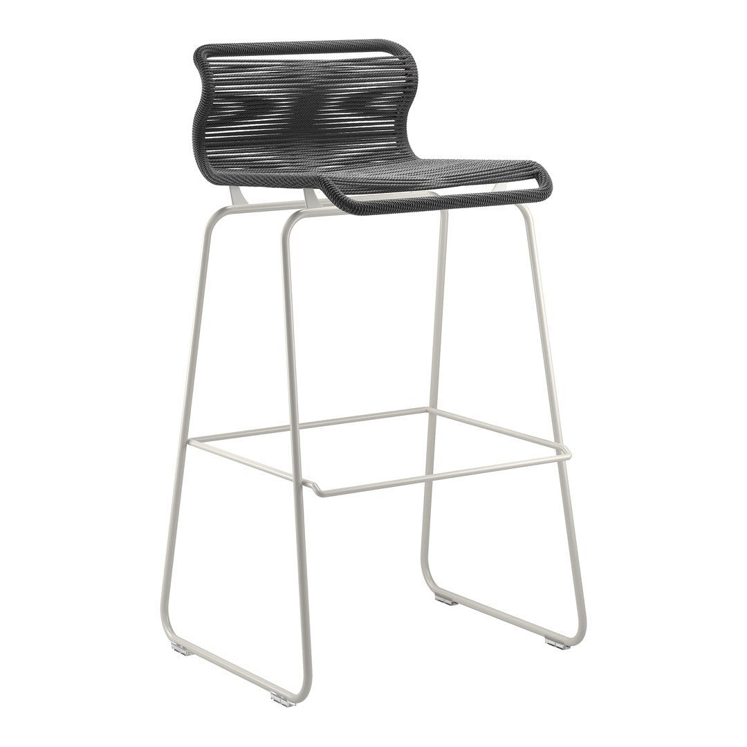 Black patterned seat with a sleek white metal frame, modern bar stool design for contemporary interiors.