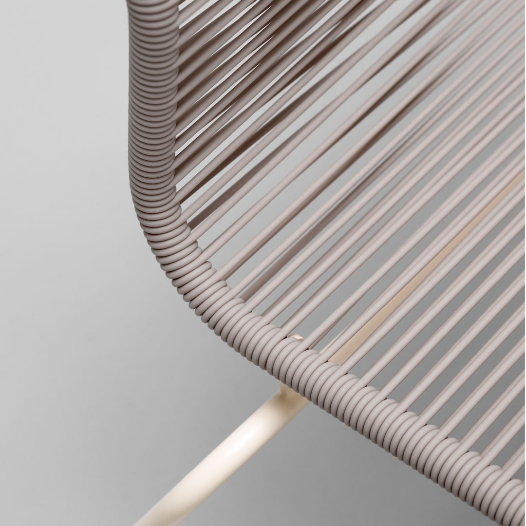 Soft taupe woven pattern with smooth beige legs, perfect for modern decor. Ideal for indoor or outdoor seating.