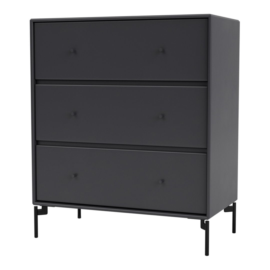 Sleek matte black dresser with three drawers and minimalist design, featuring subtle textured knob accents.