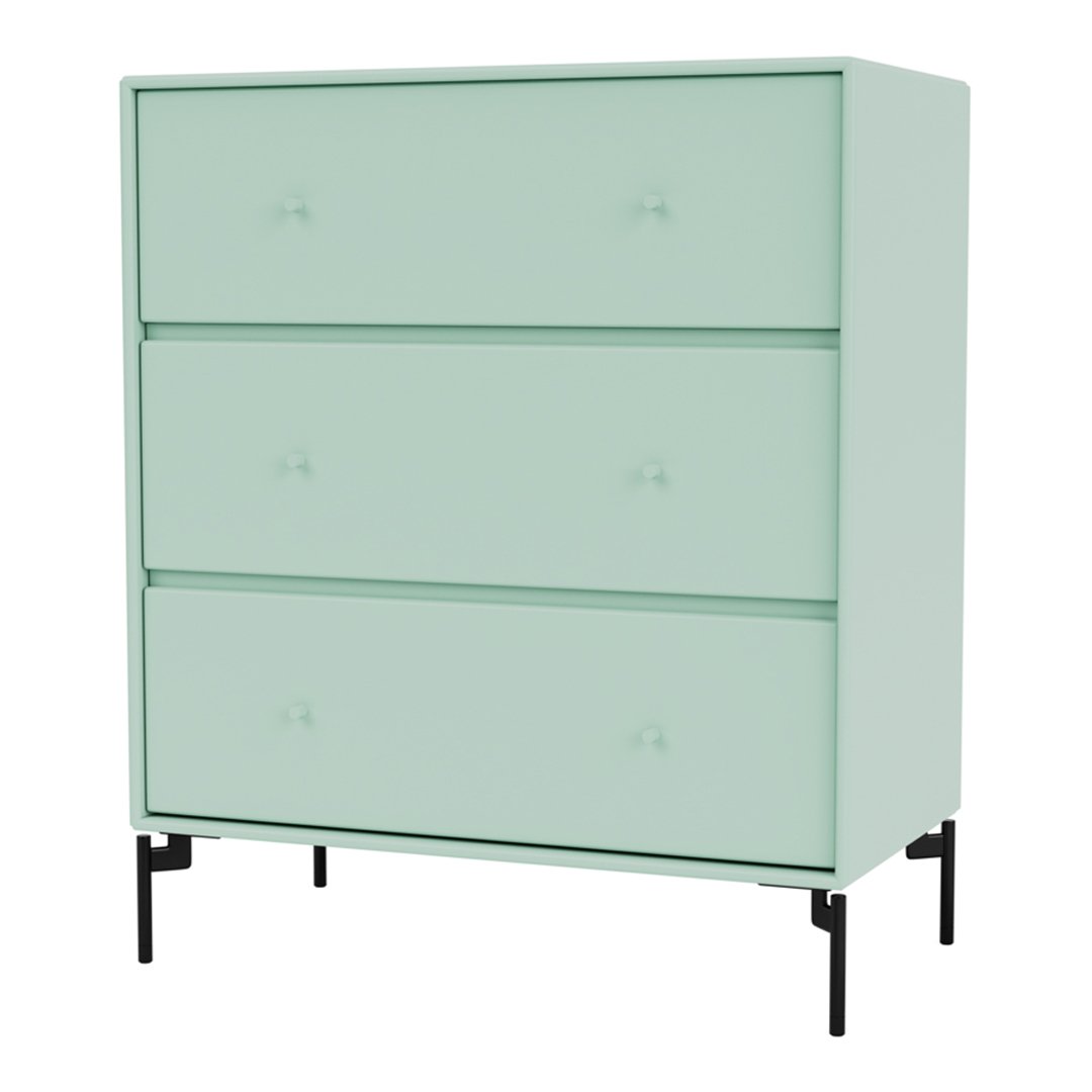 Mint green dresser with sleek black legs and minimalist design, featuring three spacious drawers.