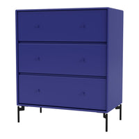 Vibrant deep blue dresser with a sleek, smooth finish and modern design, featuring three spacious drawers.
