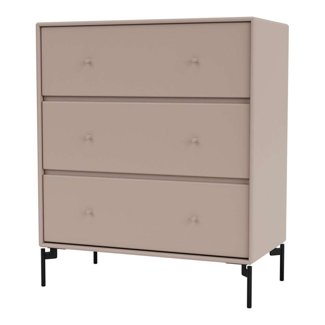 Light beige dresser with three sleek drawers and minimalistic button accents, set on black metal legs.