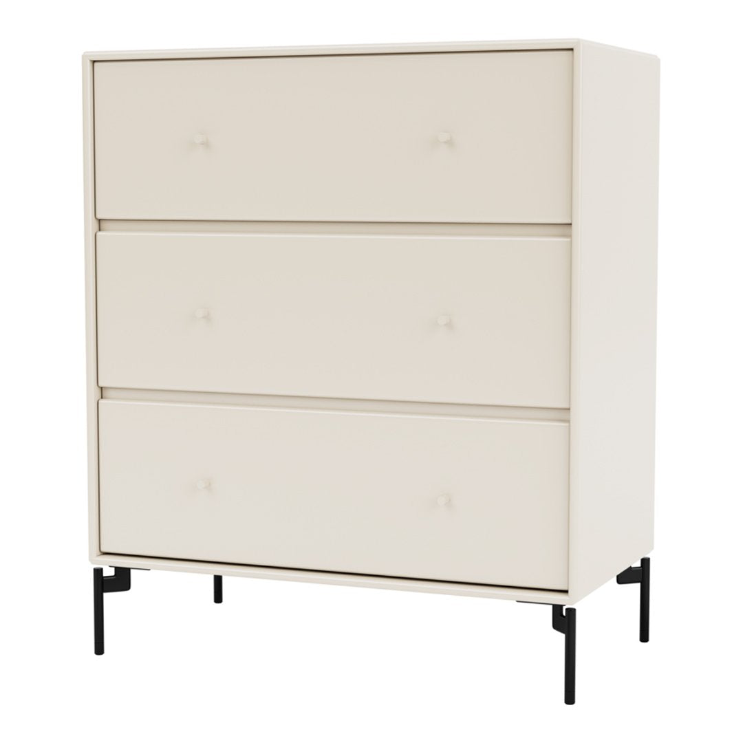 Cream-colored dresser with smooth, matte finish and simple knob details, featuring a modern minimalist design.