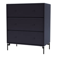 Dark navy blue dresser with simple, modern design and sleek black legs, featuring three smooth pull-out drawers.