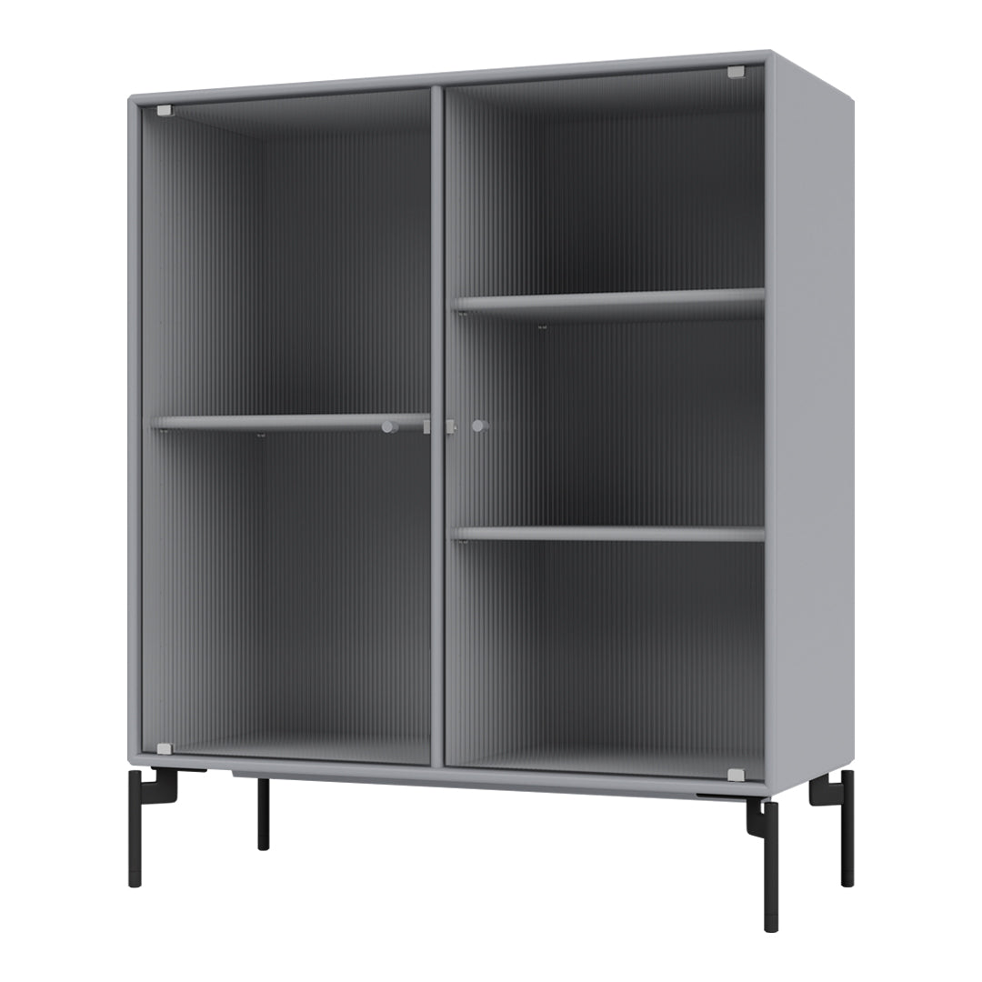 Gray storage cabinet with ribbed texture and black metal legs, featuring a sleek, modern design and open shelving.