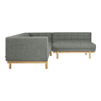 Gray upholstered sectional sofa with a grid pattern and light wood legs. Modern design for stylish living spaces.