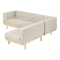 Light beige linen corner sofa with tufted pattern and natural wood legs, offering a modern and cozy aesthetic.