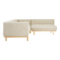 Linen beige sofa with a quilted pattern and light wood legs, perfect for modern living spaces.