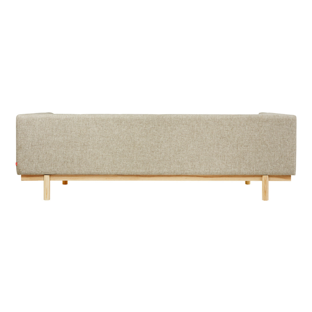 Gray fabric sofa with a simple, modern design and natural wooden legs, featuring a smooth, uniform texture.