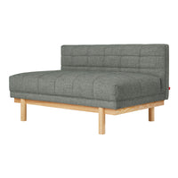 Gray tufted sofa with a sleek design and natural wood legs, perfect for modern decor.