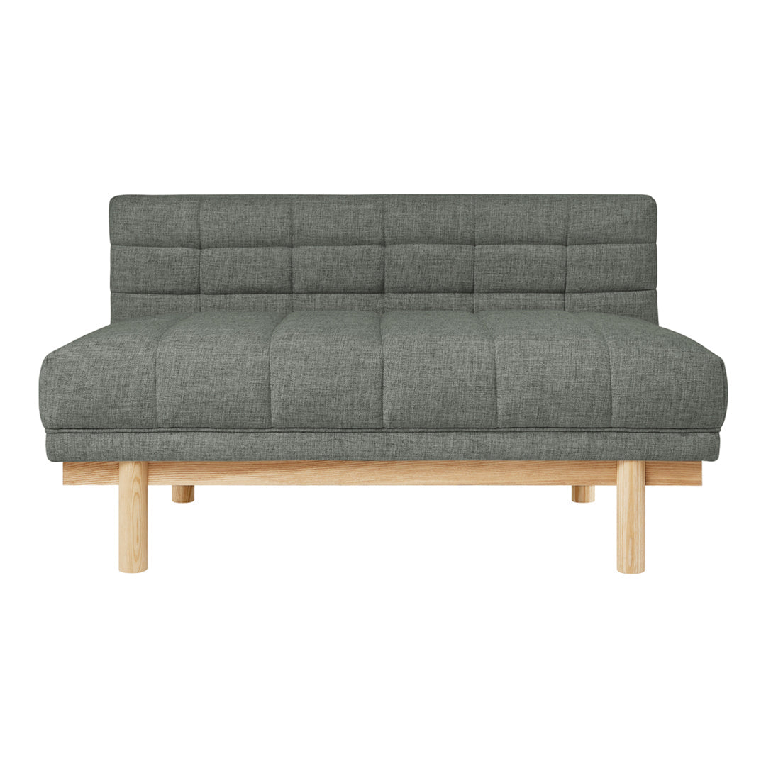 Gray tufted fabric sofa with a minimalist design and light wood legs, perfect for modern interiors.