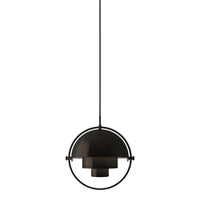 Sleek black pendant lamp with a modern geometric design, featuring circular and layered elements. Perfect for stylish decor.