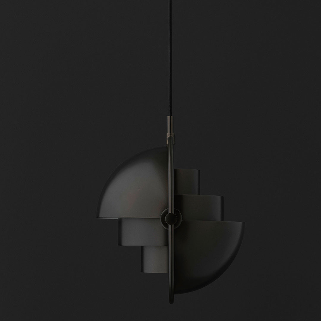 Modern black pendant light featuring geometric shapes and a sleek, matte finish. Ideal for contemporary decor.