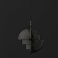 Modern black pendant light featuring geometric shapes and a sleek, matte finish. Ideal for contemporary decor.