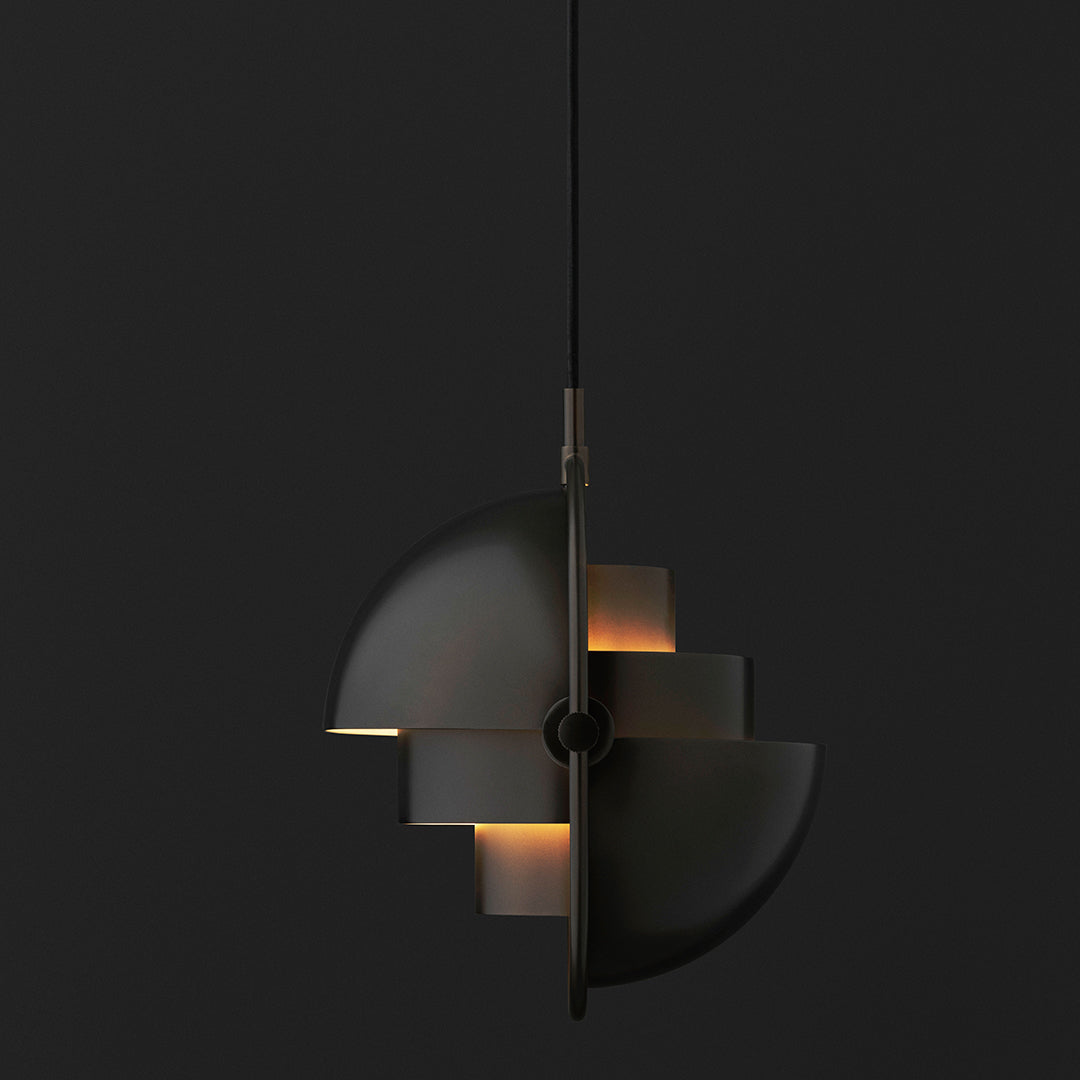Modern black pendant light with sleek geometric design and warm glowing accents. Ideal for contemporary decor.