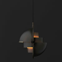 Modern black pendant light with sleek geometric design and warm glowing accents. Ideal for contemporary decor.
