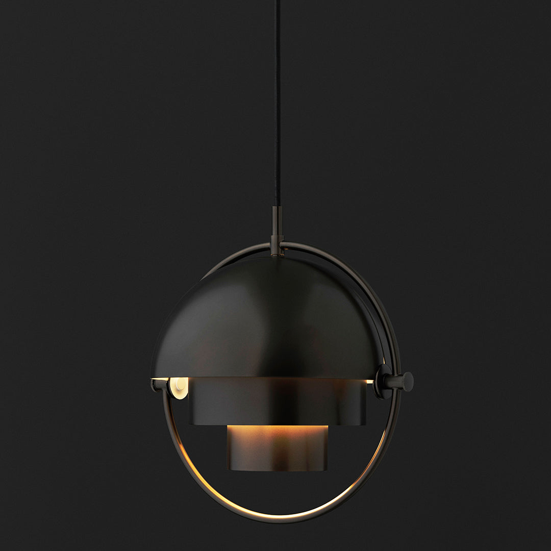 Round black pendant lamp with a metallic gold inner shade and sleek minimalist design. Perfect for modern decor.
