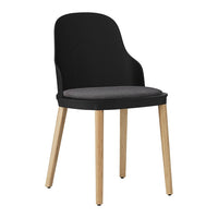 Black chair with a smooth, curved back and a grey upholstered seat, featuring natural wood legs. Perfect for modern decor.