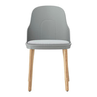 Modern gray chair with a smooth, minimalist design and light wood legs. Stylish and versatile for any space.