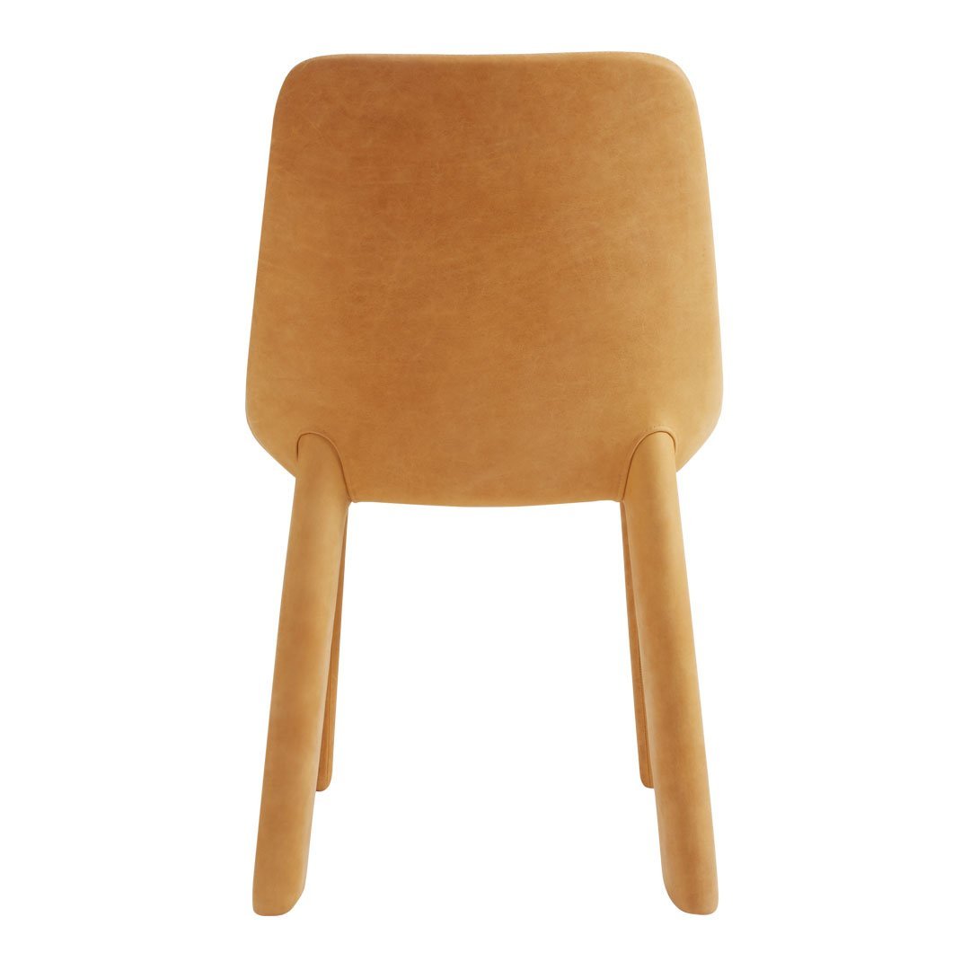 Stylish tan suede dining chair with smooth, clean lines and simple design. Ideal for modern interiors.