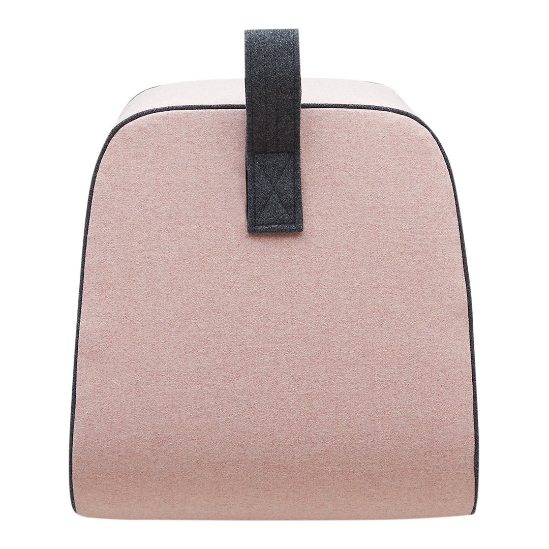 Soft pink bag with a textured finish and black trim, featuring a sturdy black handle for added style.