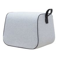 Gray fabric storage cube with a smooth texture and black trim, featuring a minimalist design. Perfect for organization.