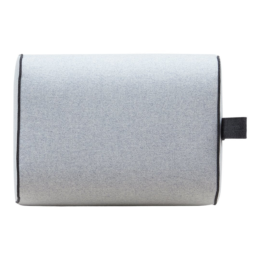 Gray textured pillow with black accent trim, showcasing a minimalist design. Perfect for modern decor.
