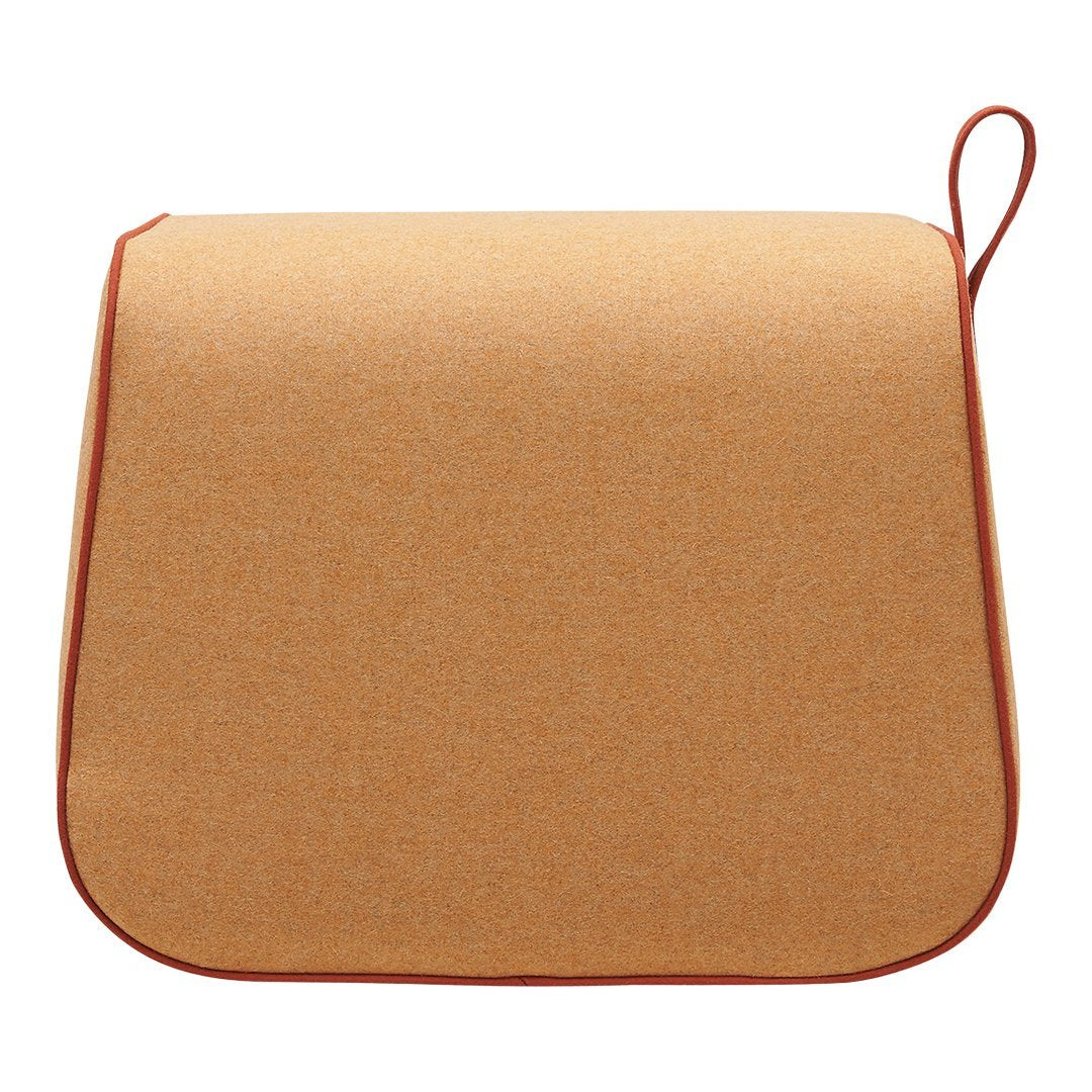Stylish tan felt mat with a contrasting red trim, perfect for adding warmth to any space.