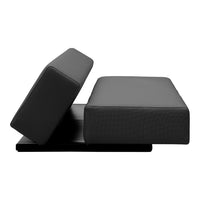 Modern black sofa with a sleek, minimalistic design and subtle textured pattern. Perfect for contemporary decor.