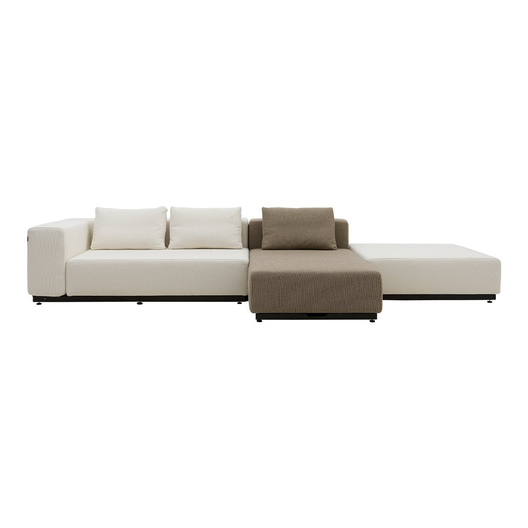 Modern sectional sofa in creamy white and brown, featuring sleek lines and plush cushions for stylish comfort.