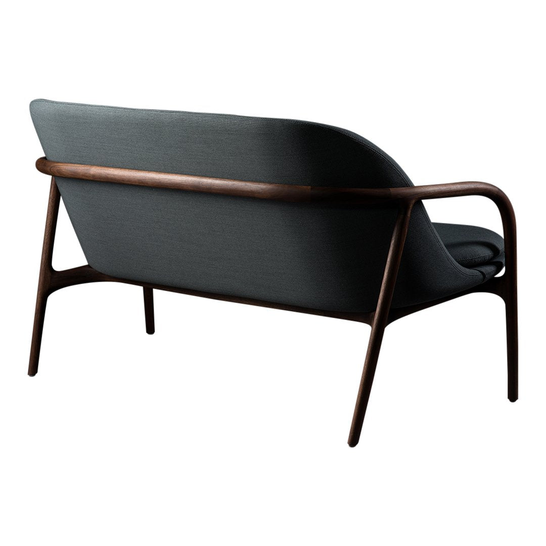 Sleek gray fabric sofa with a minimalist design and warm wooden frame, perfect for modern interiors.
