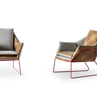 Modern chair featuring a mix of soft gray and rich brown upholstery with a striking red metal frame.