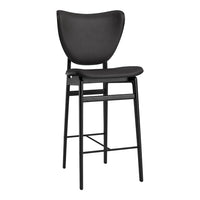 Black upholstered bar stool with a minimalist design and sleek metal legs. Ideal for modern interiors.
