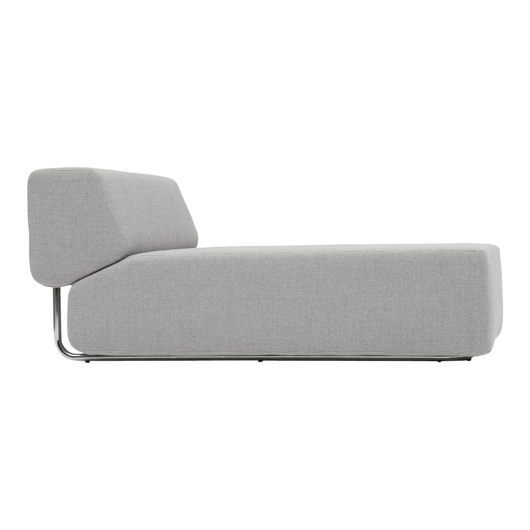 Gray modern chaise lounge with a minimalist design and subtle textured fabric, featuring sleek chrome legs.