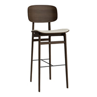 Modern bar stool featuring a dark brown wooden frame and a light beige seat, highlighted by minimalistic design.