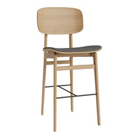 Light wood bar stool with a gray upholstered seat and a minimalist design. Perfect for modern spaces.
