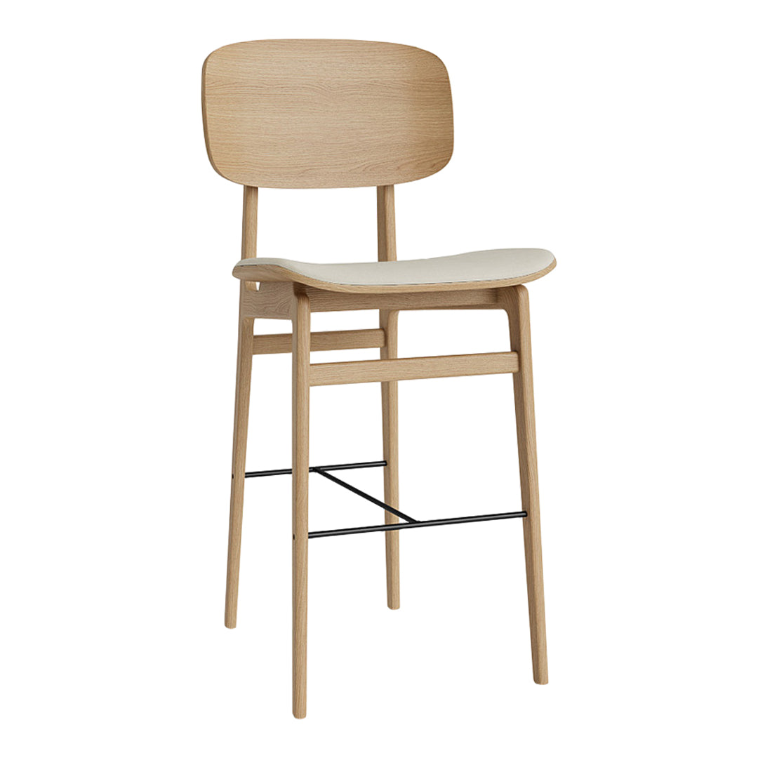 Natural wood bar stool with a light cream upholstered seat, featuring a minimalist design and clean lines.