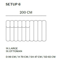"Modern sectional sofa setup in neutral tones with a smooth, minimalist design and curved lines."