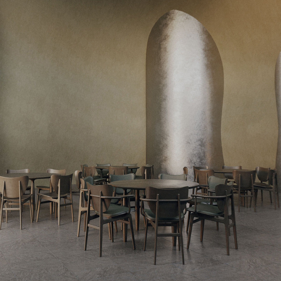 Neutral tones with textured walls and sleek, modern wooden furniture in earthy greens and browns.