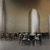 "Elegant wooden chairs in a minimalist café with neutral tones and sleek metallic accents."