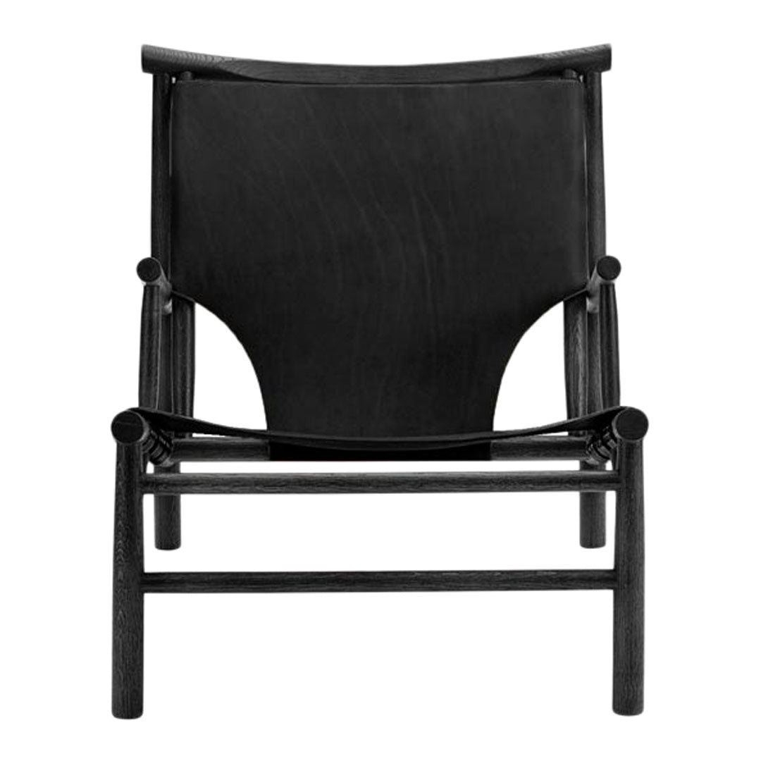 Black wooden lounge chair featuring a simple, sleek design and smooth surfaces, ideal for modern decor.