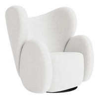 White upholstered armchair with a smooth, minimalist design and rounded, curvy arms.