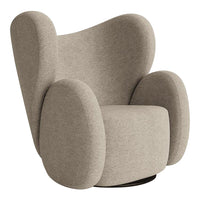 Light beige upholstered armchair with soft, rounded shapes and minimalistic design. Ideal for modern interiors.