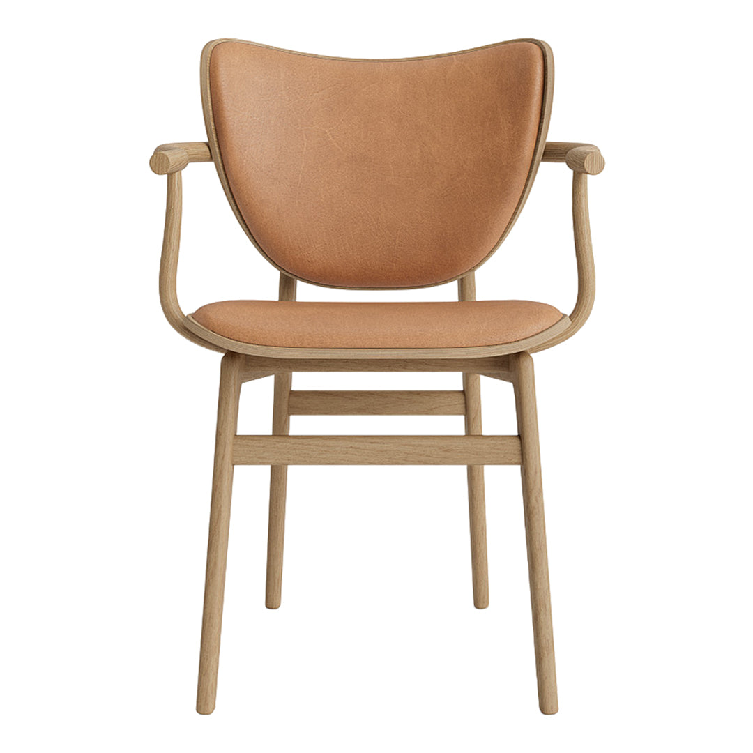 Tan leather chair with smooth texture and minimalist wooden frame in light beige. Stylish and modern design.