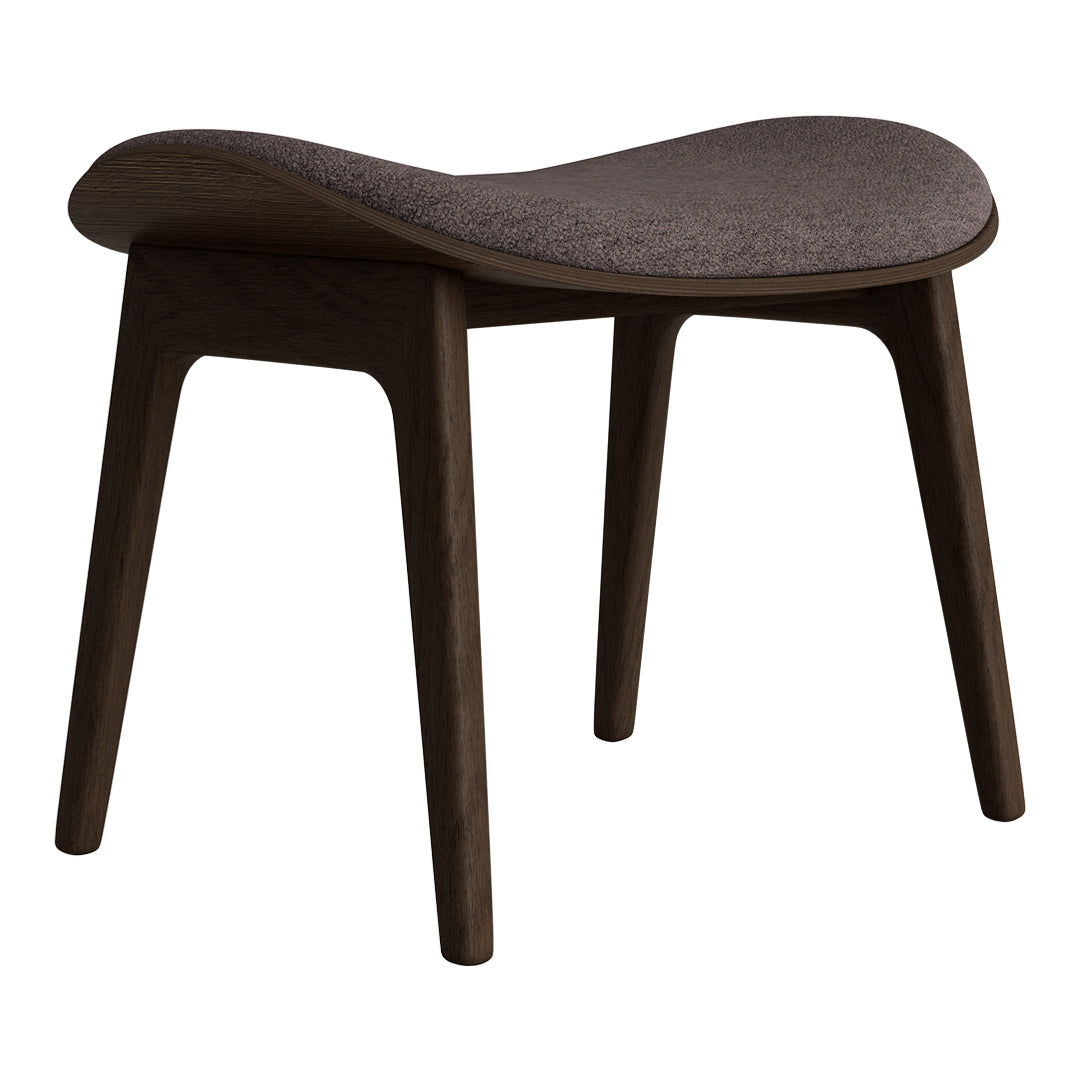 Brown wooden stool with a smooth curved design and dark gray fabric cushion. Modern and stylish home decor piece.