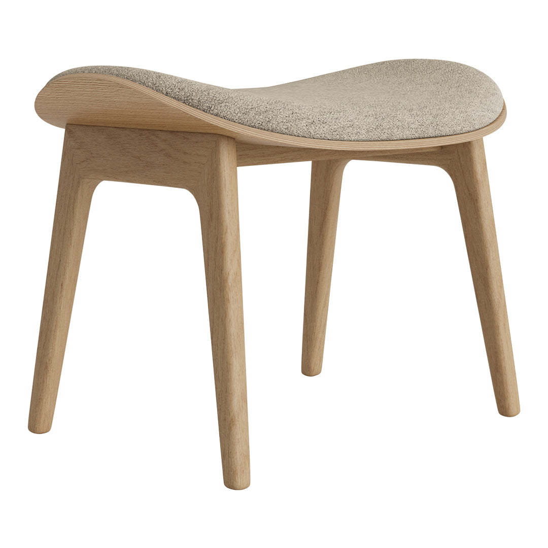 Natural wood stool with a light beige cushioned seat, featuring a smooth, curved design. Modern and minimalist style.